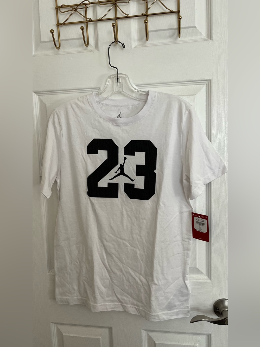 Nike Men's White Short-Sleeve Tee with Black '23' and Jumpman Graphic